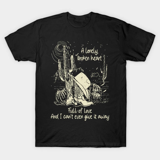 A Lonely, Broken Heart Full Of Love Cactus Cowboy Boots & Hat Desert T-Shirt by Merle Huisman